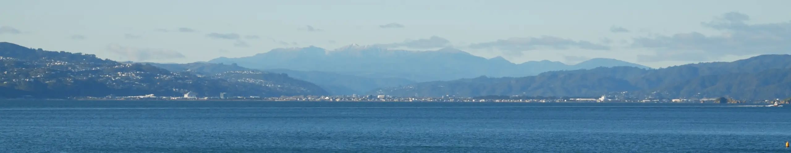 Wellington city harbour with the Tararua ranges
